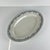 Large oval ironstone platter, "Laurels" pattern, by Moulins des Loups - Hamage, 1900 Dimensions: 34 x 23.5 cm Height: 4 cm...
