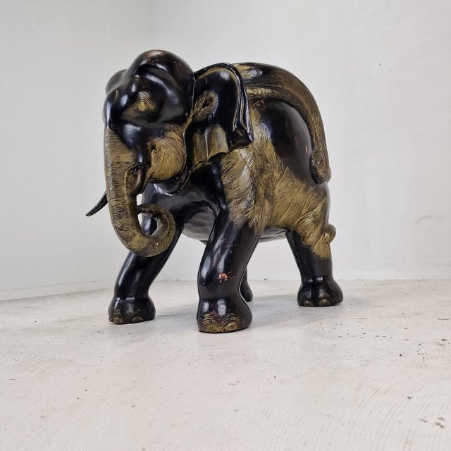 Stunning Indonesian elephant chair, fabricated in the early 19th century. This amazing chair is fabricated of wood. It has...