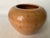 A very well crafted Turned Maple Bowl with good weight, a solid feel and fine plumbate form. Numbered 676, signed R....