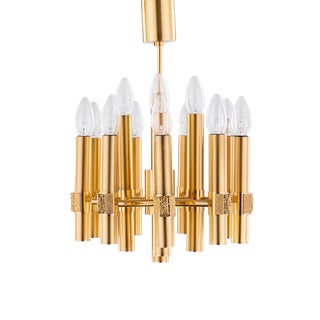 Brutalist Chandelier in Brass with 12 Arms by Angelo Brotto for Esperia, Italy, 1960s For Sale