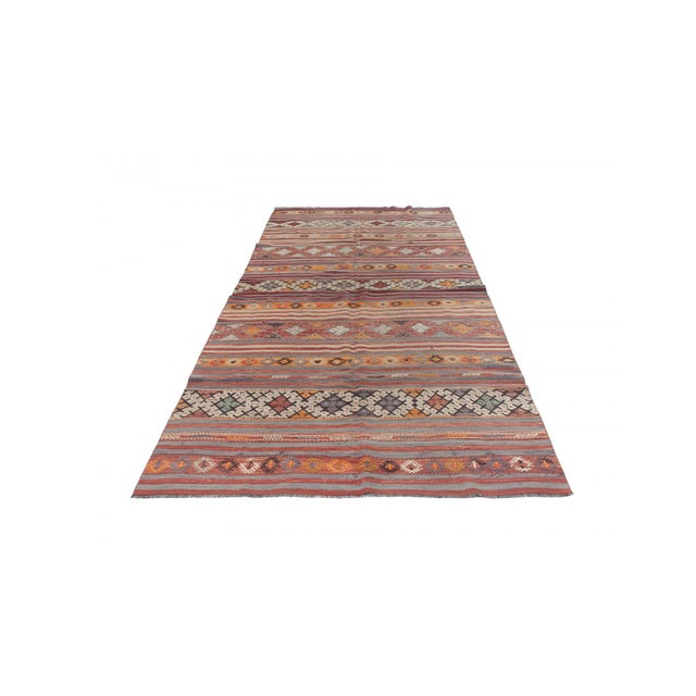 Vintage handwoven decorative kilim rug from Denizli region of Turkey. Approximately 50-60 years old. In very good condition.