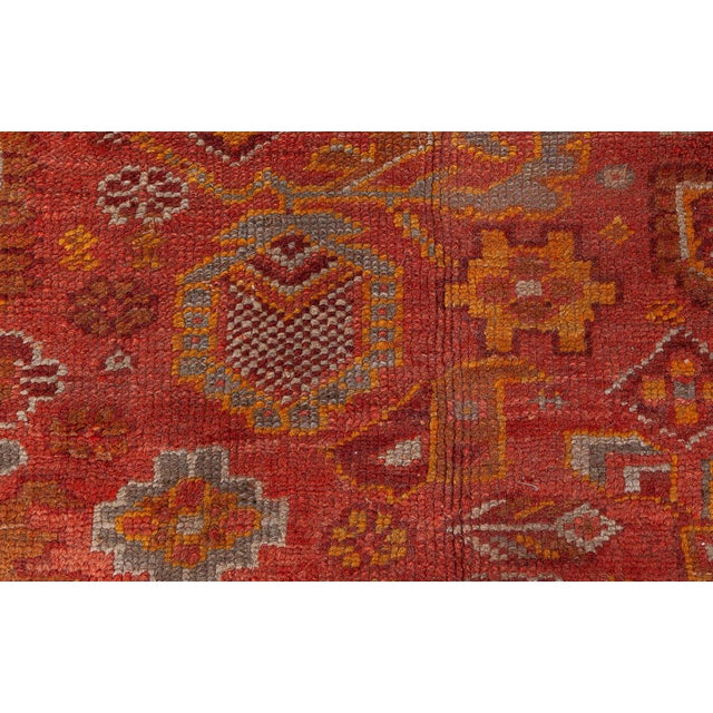 This exquisite antique Oushak rug from Turkey, dating to the early 20th century, is a masterful example of the regions...