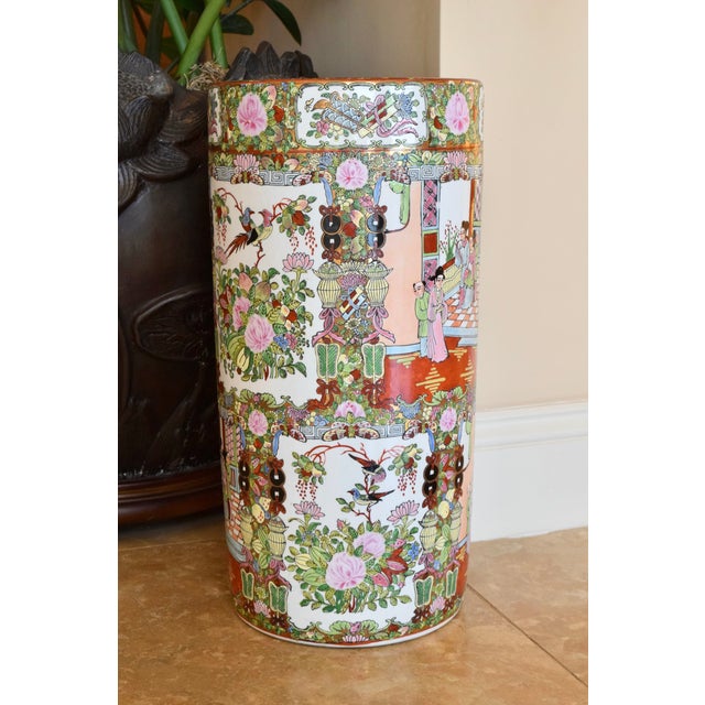 CHINESE FAMILLE ROSE PORCELAIN UMBRELLA STAND Era: Late 20th Century Style: Chinese Export OVERVIEW: An elegant Chinese...