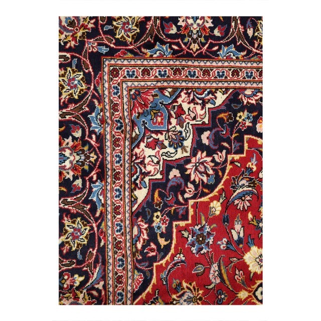 Beautiful and Finely Woven Antique Kashan Rug. This inscribed Semi antique carpet features an incomparable medallion-and-...