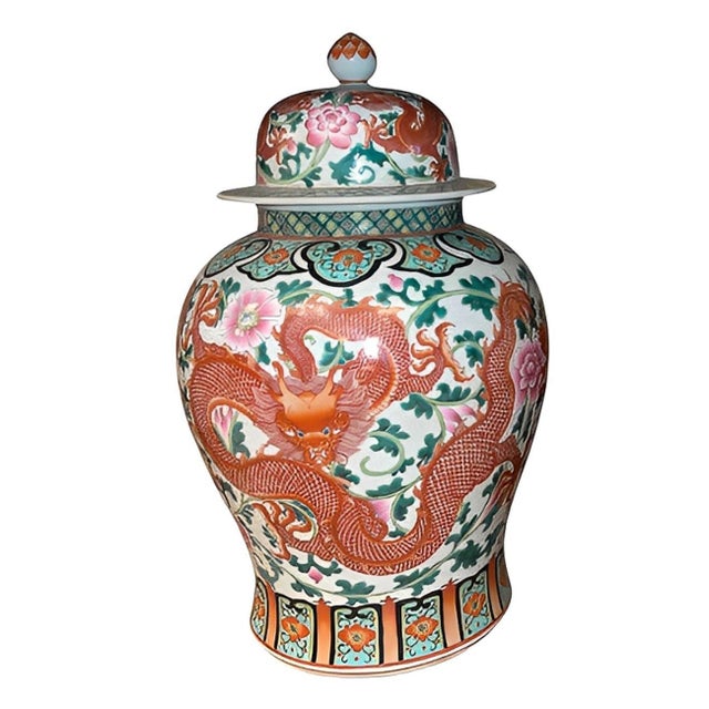 This stunning pair of Chinese Qianlong style porcelain jars showcases the vibrant color palette and intricate decoration...