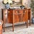 Beautiful antique Federal/Sheraton Revival sideboard, from the 1920s–1940s, featuring richly figured flame mahogany...