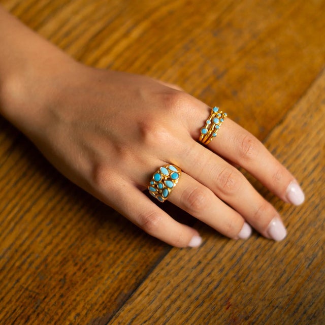 Dive into elegance with the Mystic Waves Turquoise Gold Adjustable Ring, a unique piece that blends timeless style with...