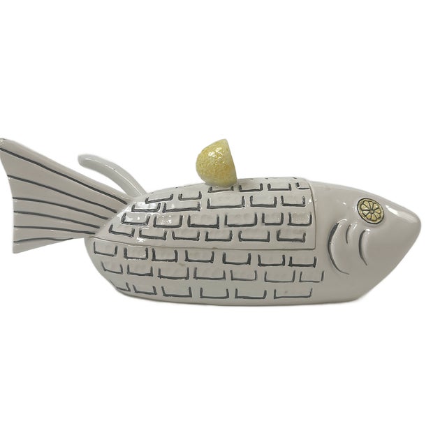 This is a whimsical 1960's mid century modern fish condiment tureen attr. to Ed Langbein. This fish is in a white ground...
