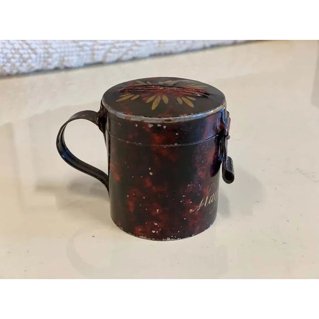 Small money box "Magdalena" in the style of stobwater Braunschweig. The savings bush is made of painted sheet metal and...