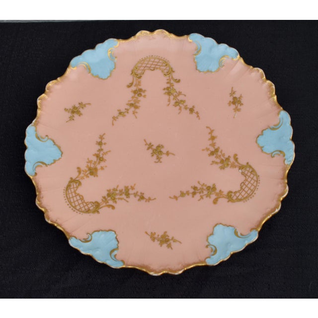 Antique Early 20th Century Round Decorative Scalloped Edge Plate. The Brand is AK Co Limoges. Porcelain. Origin is France....