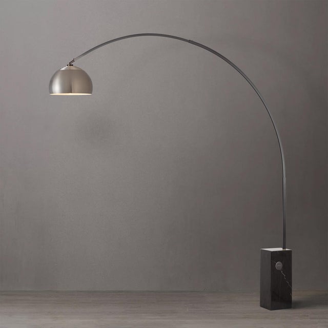Built with a black nickel steel body and a black marble base, the Iconic Arc Lamp is a Mid-Century Modern masterpiece....