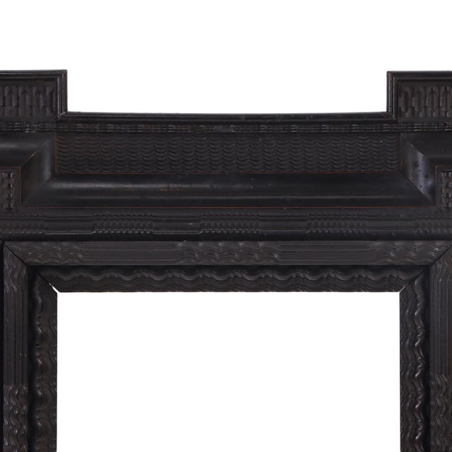 This striking frame is designed in the traditional 17th-century Baroque Northern European style. Often referred to as a...