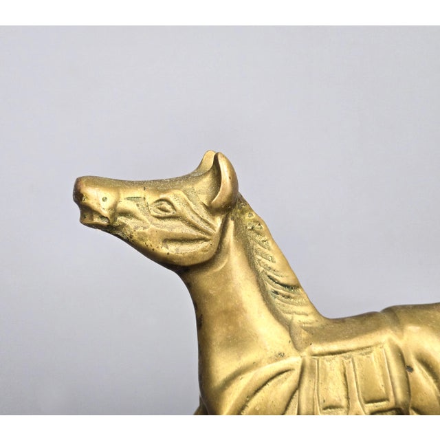 A small size rocking horse. Great condition with age related wear to finish. Size: 6" long, 1 1/2" wide, 4 3/4" tall Check...