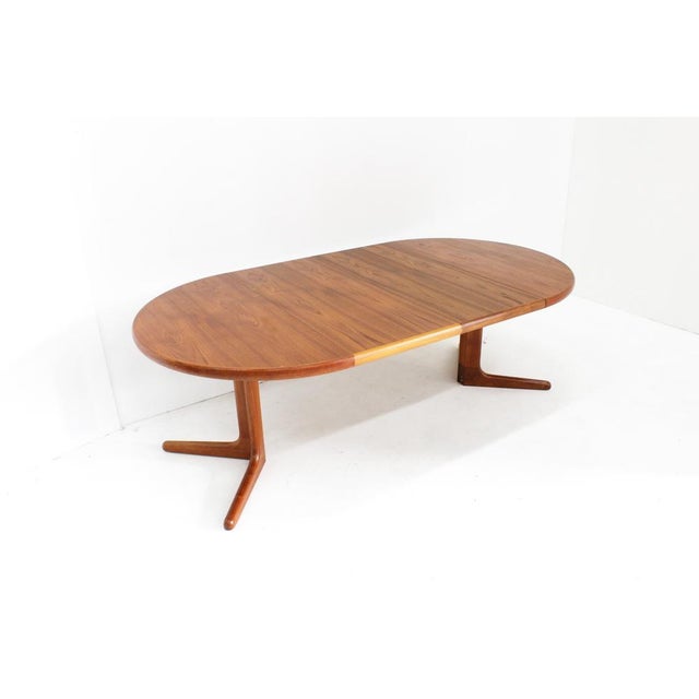 Vintage Danish round extendable dining table teak 1960s Vintage Danish round extendable dining table from the 1960s made...