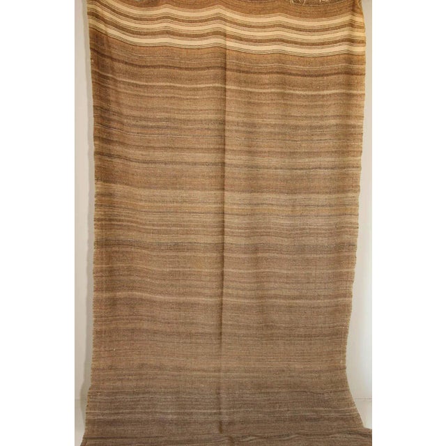 1960s Vintage Moroccan rug flat-weave tribal brown Kilim or blanket.Large size blanket vintage Moroccan rug, handwoven by...