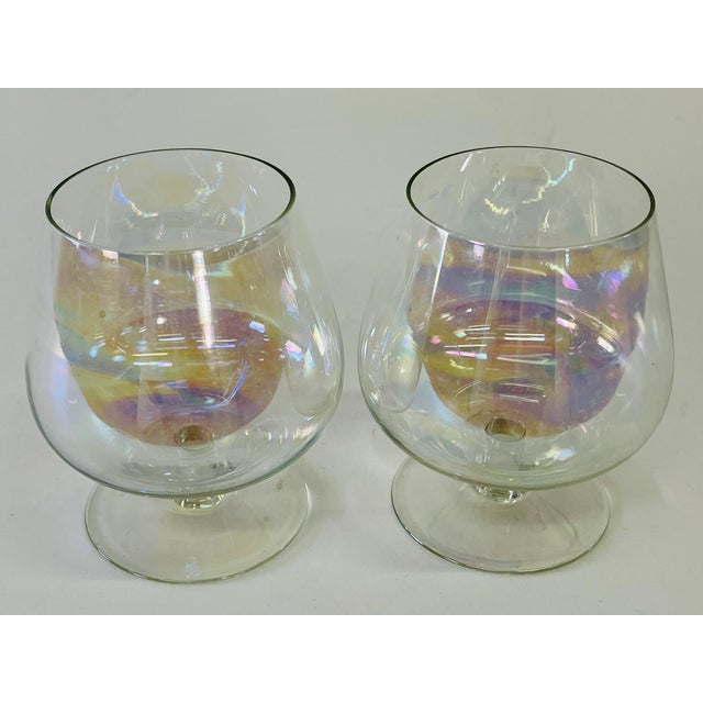 Vintage 1960s pair of iridescent delicate glass brandy snifters. No marks.