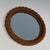 This lovely round mirror is made of rope. It is a French work in the style of Adrien Audoux and Frida Minet (Audoux-...