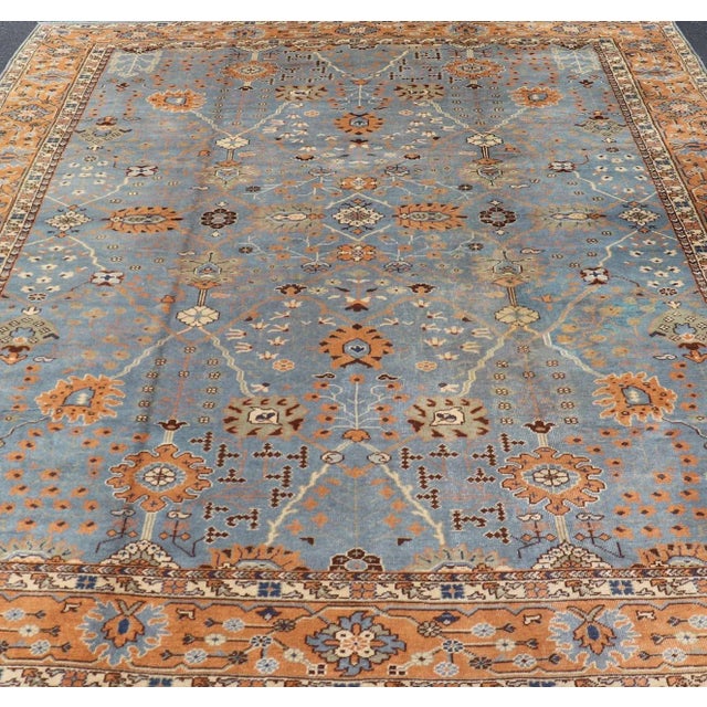 Antique Turkish Oushak Rug with Medallion With Light Gray-Blue, Cream, and Brown. Keivan Woven Arts / rug EN-142046,...