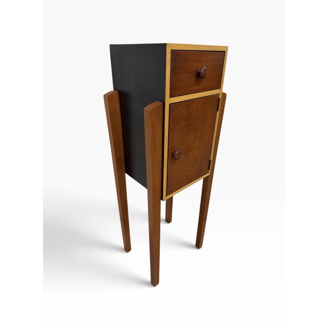 The Vintage Art Deco Style Ethan Allen Maple Wood Cabinet "Storkie" Storage Wine Bar is a charming and unique piece of...