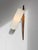 A very beautiful large adjustable wall light, modernist, fifties, from forme-libre, large tapered base in solid mahogany...