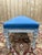 Large louis xvi style bench in carved and painted wood, displaying an antique patina with signs of wear that reveal the...