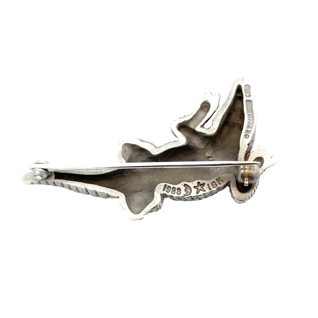 Iconic 18K white gold crocodile pin by Kieselstein, crafted in 1988 ( based on the marks stamped on the piece). A...