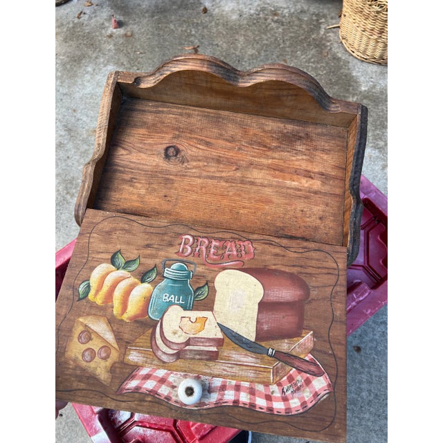Up for consideration is a beautiful vintage wooden hand painted bread box. This would look lovely on display in your...