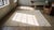 1930s White Cream Floral Antique Indian Cotton Agra Rug 6'4" X 7'10" Handknotted Wool Carpet For Sale - Image 9 of 9
