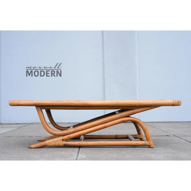 This coffee table is pure boho eye candy with one of the most unique bases you'll ever see! Top surface is made of...