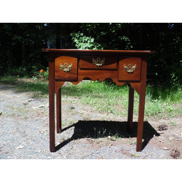 Vintage Solid Cherry Petite Console Hall Table Chippendale Style Lowboy Dressing Table has serpentine top above 3...