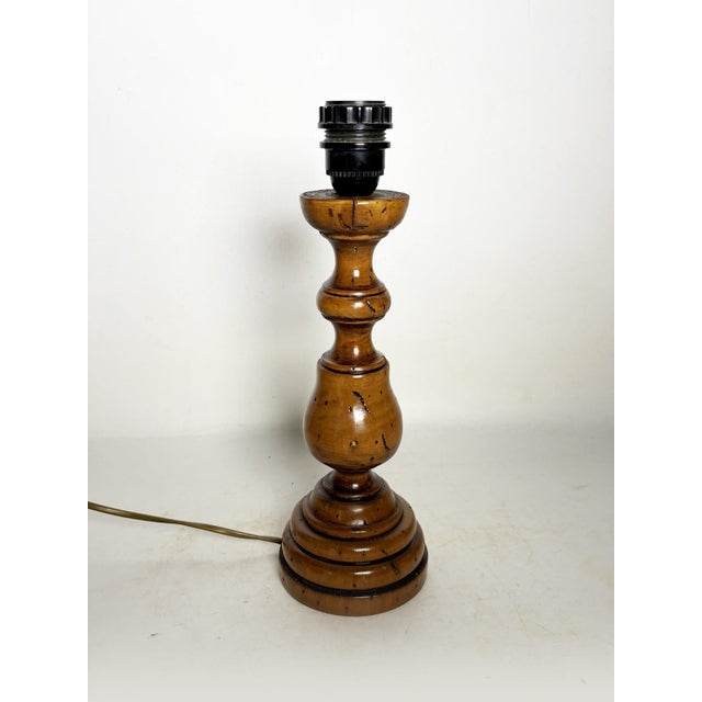 The lampshade is not included. Turned wood lamp with an antique patina, France, 1970s, with authentic and timeless charm....