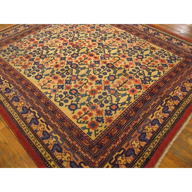 Mid 19th Century Central Asian Yarkand Carpet Rarely are East Turkestan carpets square. An allover repeat pastern of...