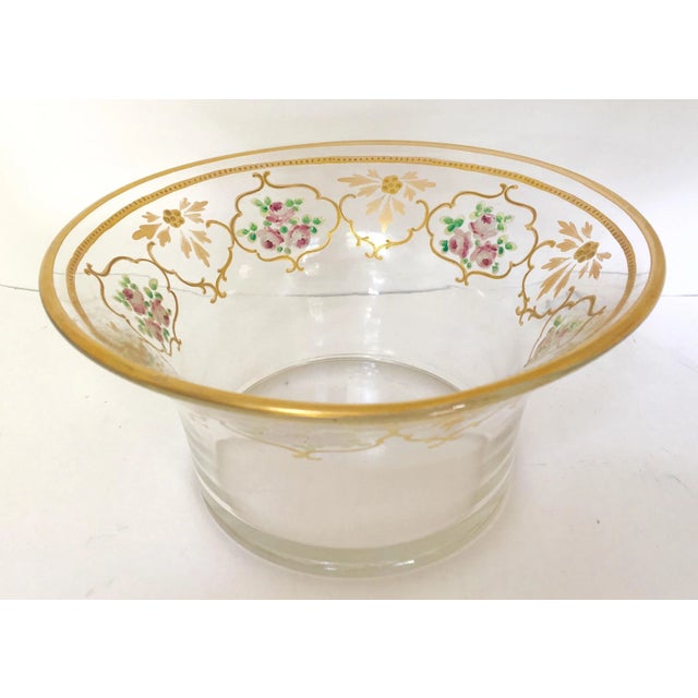 Floral and gold rimmed hand painted glass serving bowl with a fluted edge. Pink flowers decorate the top edge of this...