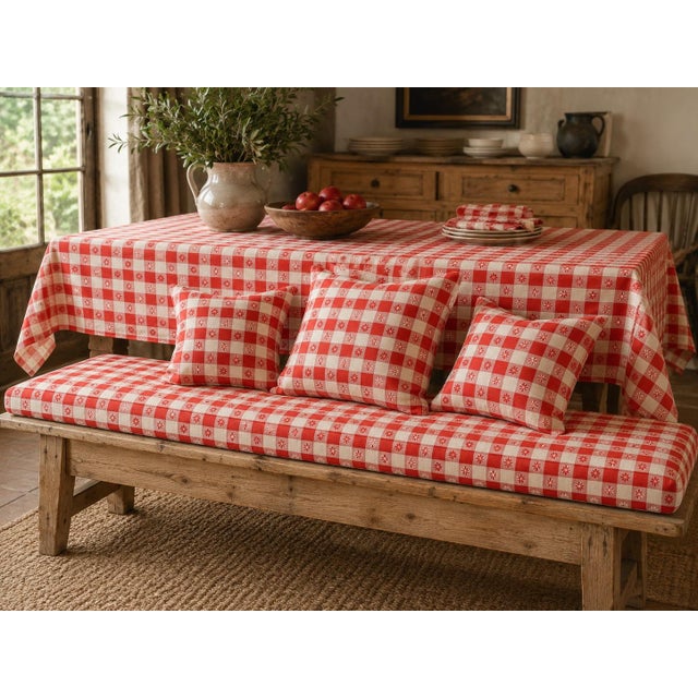 Mid 20th century unused Schwartz Leibman printed fabric in a cheerful red and cream check with stylized floral motifs....