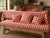 Mid 20th century unused Schwartz Leibman printed fabric in a cheerful red and cream check with stylized floral motifs....
