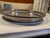 Here we have a very pretty round silver-plated tray. This one is made in America by Oneida with lovely chased center...