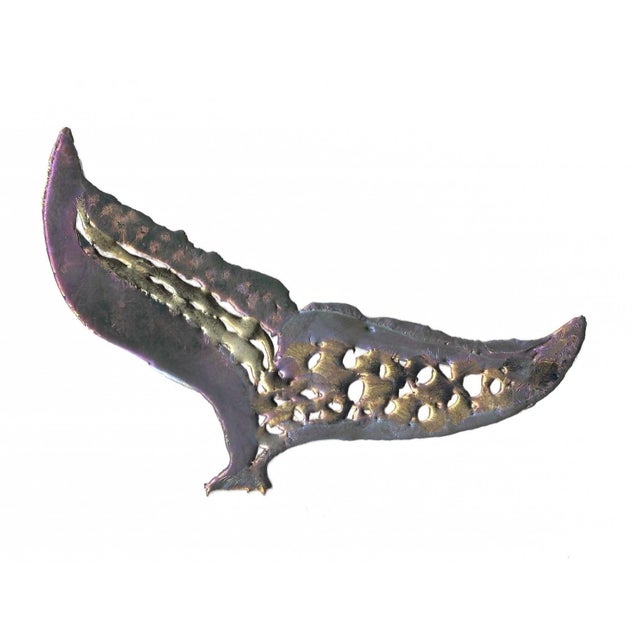 2009 whales tale metal sculpture painted in metallic paint and affixed to a mat board. Signed on the bottom and beneath on...