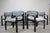 A distinctive set of ten vintage armchairs designed by Ludvik Volak and manufactured by Dřevopodnik Holešov in...