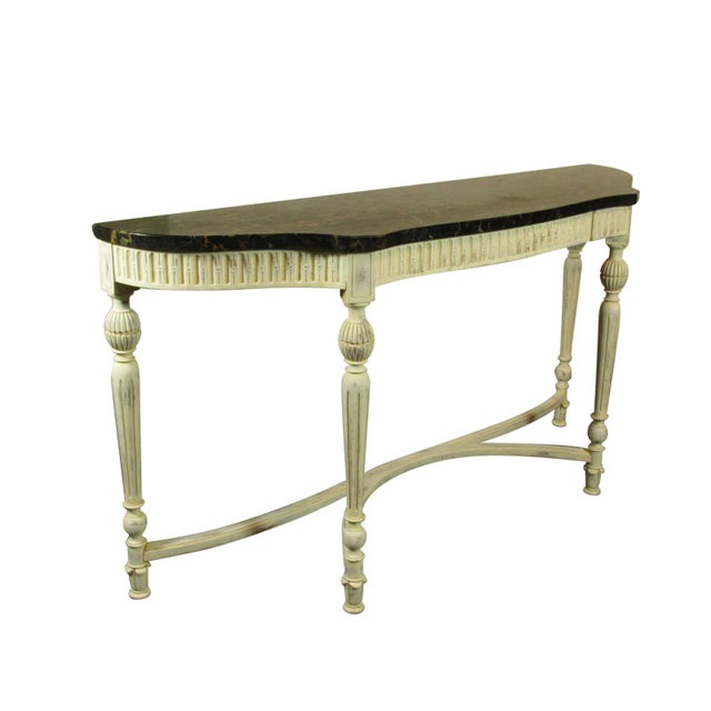 A late 19th-C Italian painted console table with original Portoro marble top. Features original painted finish, hand...
