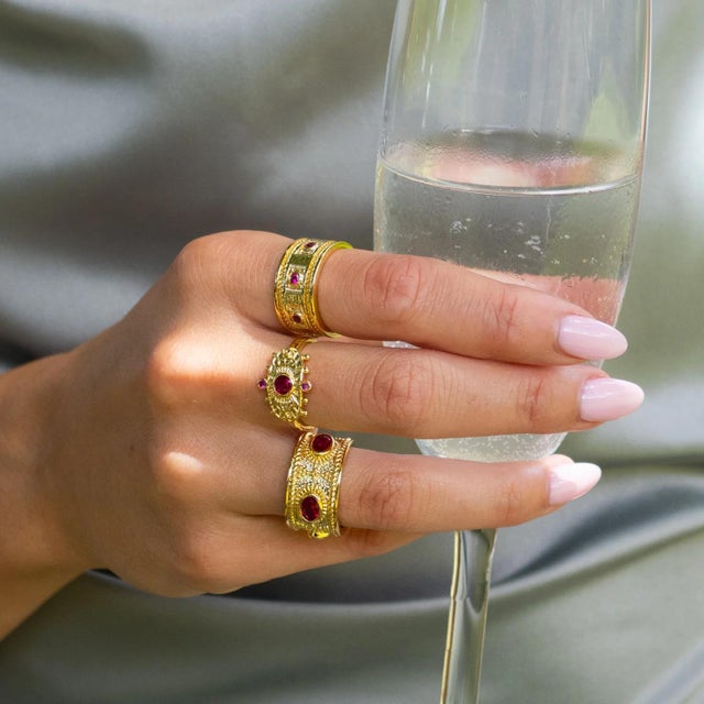 Ignite your inner fire with the Queen Cleopatra Ruby Energy Cuff Adjustable Ring, a bold and luxurious piece from the...