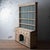A Welsh oak dog kennel dresser, c.1800, bleached finish with a painted backboard, open plate rack, and lower case fitted...