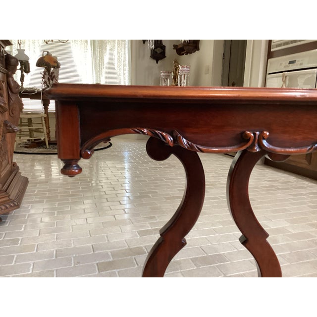 This antique solid mahogany harp art nouveau table is a unique piece of furniture that exudes elegance and charm. The...