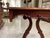 This antique solid mahogany harp art nouveau table is a unique piece of furniture that exudes elegance and charm. The...