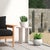 With gorgeous crescent-shaped legs and a round top, this outdoor terrazzo-style table offers a playful and earthly look...