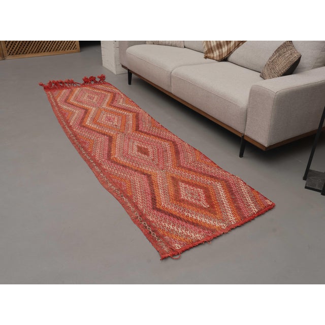 Vintage Hand-Knotted area rug is a semi-antique vintage area rug. The '70s Eastern region of Anatolia's unique rug is...