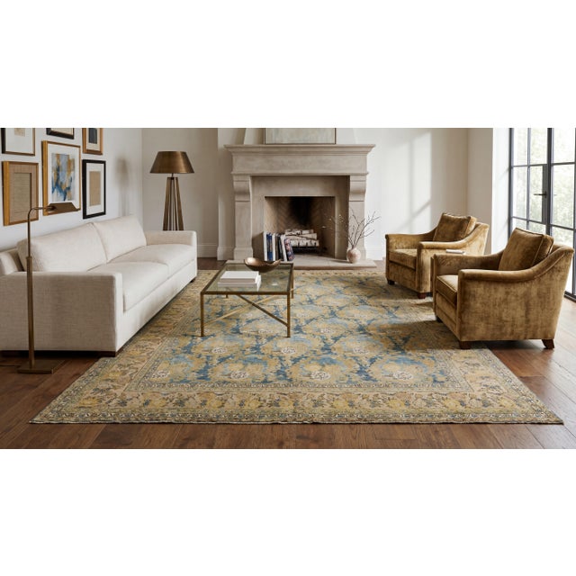 This exceptional antique Mahal wool rug showcases a rare and striking overall composition of repeating, ornate floral...