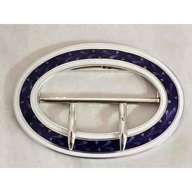 A fine Edwardian sterling silver belt buckle dating to 1910, displaying an elegant combination of Art Nouveau design,...