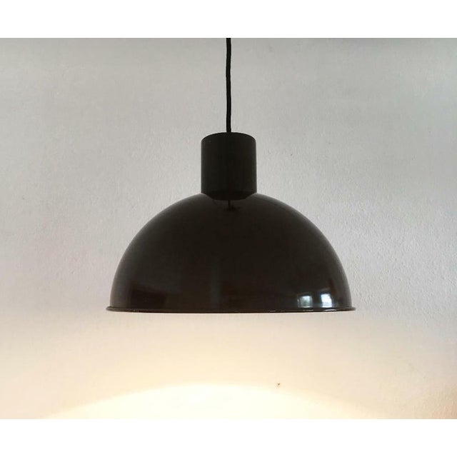 Bunker pendulum from the Danish manufacturer Fog & Mørup after a design by Jo Hammerborg. Simple pendant lamp in classic...