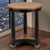 Elegance and classical simplicity are beautifully expressed in this French round end table, created during the Art Deco...