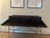 Authentic Elios writing desk designed by Antonio Citterio for Maxalto / B&B Italia, finished in wenge with a slender steel...